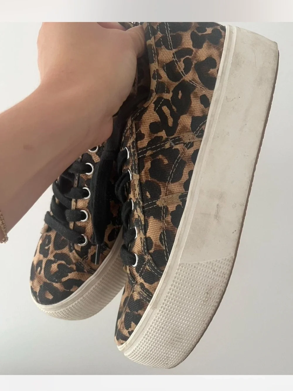 Steve Madden low top cheetah print sneaker.